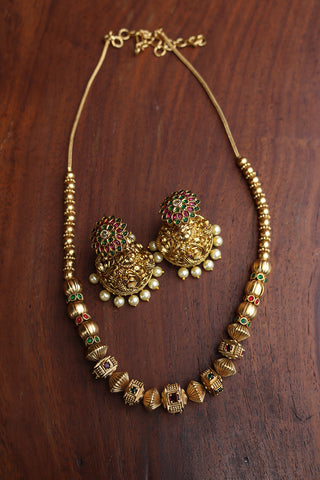 Ruby Green Square Maala and Sunflower Jhumkas
