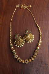 Ruby Green Square Maala and Sunflower Jhumkas