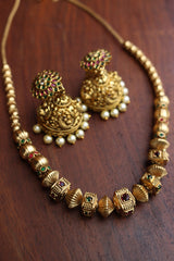 Ruby Green Square Maala and Sunflower Jhumkas
