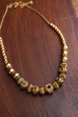 Ruby Green Square Maala and Sunflower Jhumkas